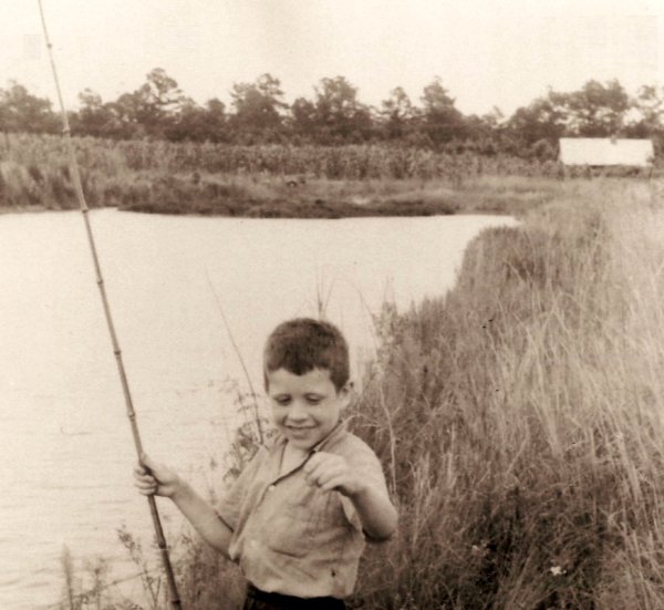 Ms. Tena's
              house with addition in the background across the pond