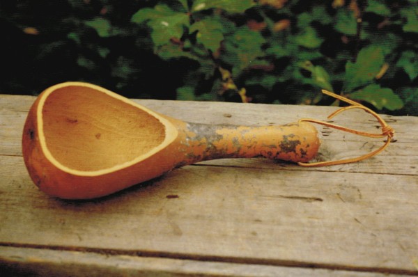 gourd with
              leather thong