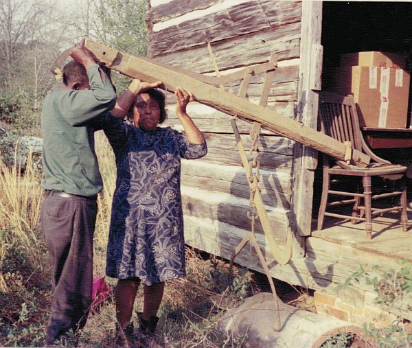 Archie & Catherine Waiters showing how gin house
              scale parts fit together