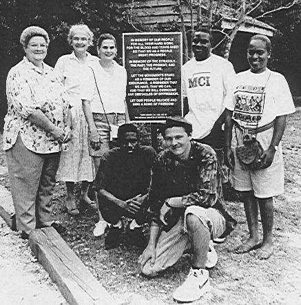 Local students
              visiting hewn-timber houses